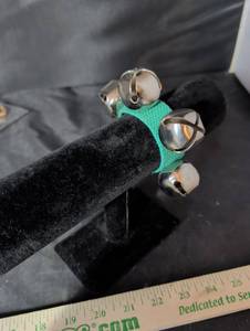 lot 238 image: Jingle Bell Wrist Strap with Silver Bells