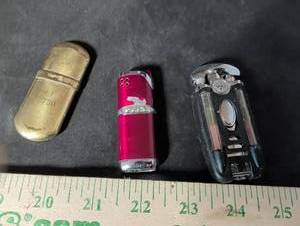 lot 249 image: Lot of 3 Pocket Lighters - Brass Engraved, Red Rhinestone, and Black Mechanical