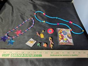 lot 250 image: Mixed Lot of Beaded Necklaces, Lapel Pins, Earrings and TMNT Collectible