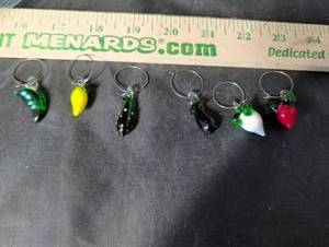 lot 254 image: Glass Vegetable Wine Charm Set