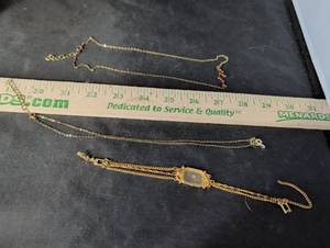 lot 281 image: Gold-Tone Constellation Necklace and Multi-Chain Bracelet Set