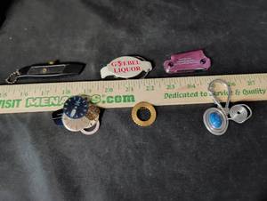 lot 296 image: Mixed Lot of Watch Dials, Pocket Knife, Keychains, and Wire Wrapped Pendant