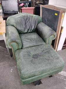lot 60807 image: Brass Nailhead Trim green leather armchair and Ottoman