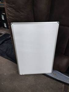 lot 60868 image: white dry erase board with a silver aluminum frame