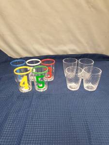 lot 2345 image: Set of 9 Drinking Glasses - Numbered Color Rim Tumblers and Textured Clear Glasses