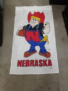 lot 2545 image: Nebraska Cornhuskers Herbie Husker Banner Flag by The Flag Factory