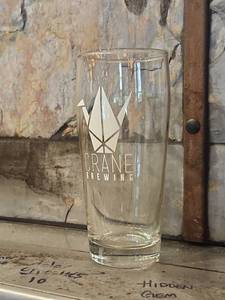 lot 12573 image: Crane Brewing 16oz Branded Pint Glasses Set