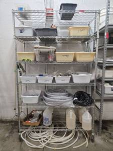 lot 12586 image: 6-Tier Chrome Wire Shelving Unit with Assorted Electrical, Plumbing, and Hardware Supplies