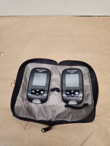 lot 23 image: Accu-Chek Guide Blood Glucose Meter Set of Two with Carrying Case