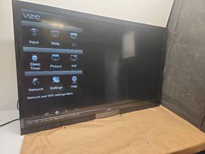 lot 31 image: 47 Vizio Large Screen LCD Flat Panel TV with WiFi and HDMI