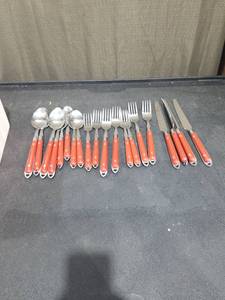 lot 1588 image: Stainless Steel Flatware Set with Red Handles