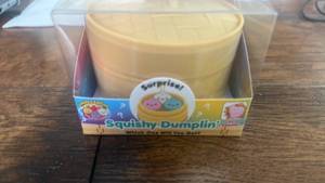 lot 105 image: Limited Edition Squishy Dumpling with Case