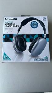 lot 211 image: NiZONi Slim Style Wireless Headphones with FM Radio