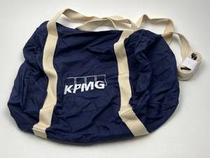 lot 128 image: KPMG Branded Navy Blue Duffle Bag Lot of 50