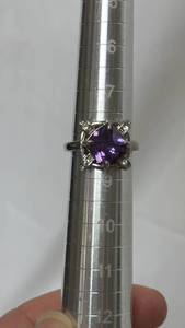 lot 16 image: Beautiful silver tone and purple stone ring