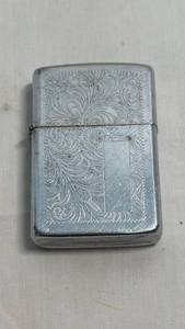 lot 22 image: Zippo Chrome Lighter with Floral Scroll Engraving