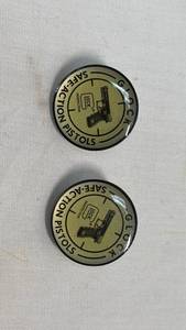 lot 29 image: Glock Safe-Action Pistols Lapel Pin Set of 2