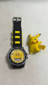 lot 33 image: Pokemon Pikachu Digital Watch with Figure by Accutime