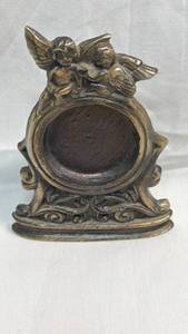 lot 38 image: Brass Cherub Miniature Photo Frame