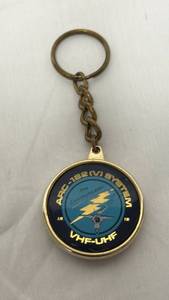 lot 79 image: Collins Rockwell International & ARC-182(V) VHF-UHF Communicator System Keychain