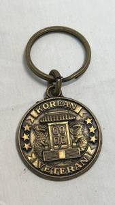 lot 88 image: Korean Veteran Brass Tone Metal Keychain