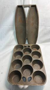 lot 93 image: Cast Iron 11-Cup Muffin Pan & Vienna Roll Pan