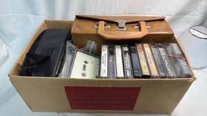 lot 98 image: Large Lot of Music Cassette Tapes with Carrying Cases