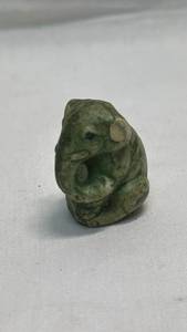lot 129 image: Japanese Green Stone Carved Elephant Netsuke Figurine