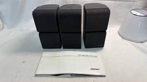 lot 137 image: Bose Double Cube Speaker Lot with Cables and Accessories