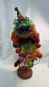 lot 145 image: Decorative Clown Jester Figure on Metal Unicycle Stand