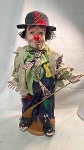 lot 147 image: Porcelain Hobo Clown Doll with Broom on Wooden Base