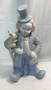 lot 157 image: Lladro Porcelain Clown Figurine with Rabbit and Cane