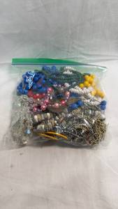 lot 162 image: Mixed Costume Jewelry Lot with Beaded Necklaces, Earrings, and Red Hat Bracelet