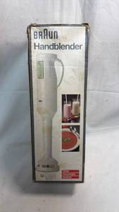lot 179 image: Braun MR 310 Hand Blender with Beaker, Wall Holder and Manuals