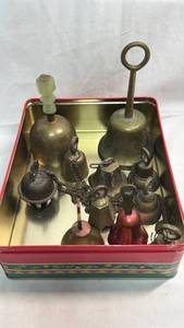lot 188 image: Collection of Brass Hand Bells in Decorative Tin