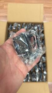 lot 218 image: Lot of 210 Vaswani 5.9V 1A Power Supply Adapter Cords. Opened box to show contents