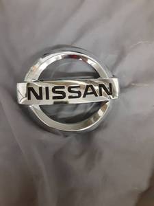 lot 384 image: Nissan Chrome Emblem Badge - Retail $15