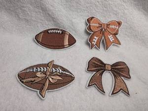 lot 1345 image: Football & Bow Embroidered Iron-On Patch Set