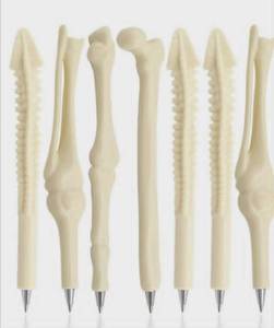 lot 1338 image: Skeleton Bone Shaped Novelty Pens Set of 6