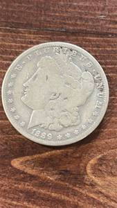 lot 60548 image: 1889-O Morgan Silver Dollar