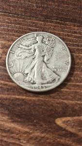 lot 60583 image: Walking Liberty Silver Half Dollar