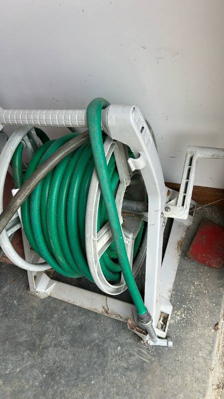 lot 798 image: Garden Hose Reel with Green Hose