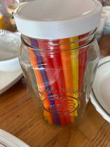 lot 252 image: Golden Harvest Glass Jar with Colorful Taper Candles
