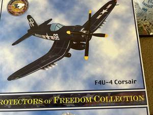 lot 263 image: F4U-4 Corsair Protectors of Freedom Collection Die-Cast Model