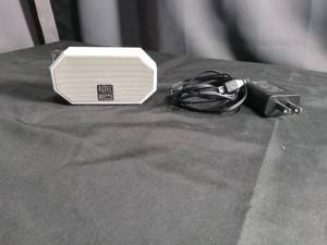lot 5535 image: Altec Lansing White Portable Bluetooth Speaker with Charging Cable