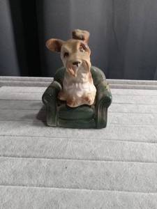 lot 5290 image: Ceramic Dog Salt and Pepper Shaker Set with Green Armchair