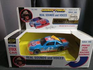 lot 50341 image: Road Champs Richard Petty #43 STP Sounds of Power 143 Scale Die-Cast Stock Car
