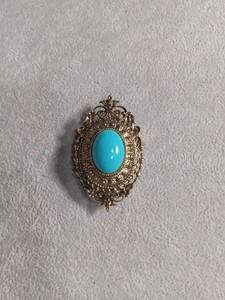 lot 50399 image: Silver Filigree Brooch with Turquoise Cabochon