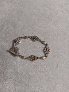 lot 50409 image: Silver Filigree Diamond Link Bracelet with Toggle Clasp