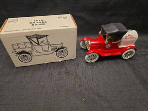 lot 50787 image: 1918 Old Milwaukee Barrel Bank Die-Cast Metal Car
